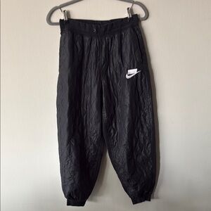 Nike Black Track Pants with Elastic Waistband and Cuffed Ankles